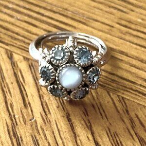 Avon Woman's Silver tone, blue stone ring, sizing adjustable 2.5-4.5 ,